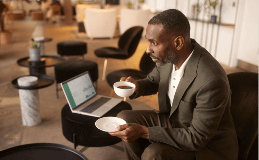 Freelancer working remotely with portable 5G internet from Three Business